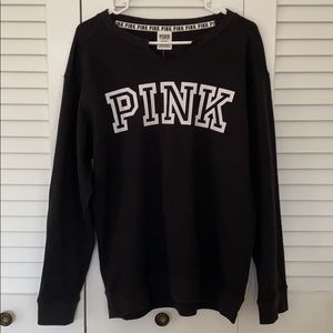 An oversized black sweater from the brand pink.